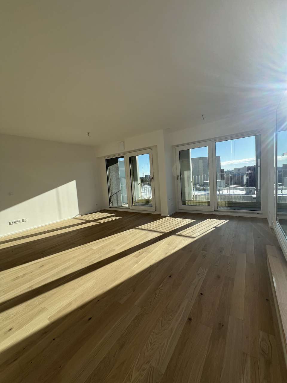 Sonnige und helle 2-Zimmer-Dachterrassen-Wohnung mit Bergblick in Pasing
